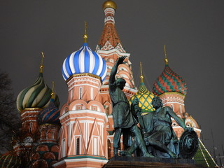 Fototapeta na wymiar Minin and Pozharsky monument and St. Basil's cathedral on Red Square in Moscow at night in winter