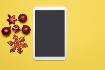 Christmas decoration with digital tablet on the desk, screen has clipping path