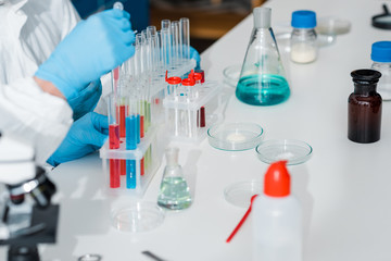 Fototapeta premium cropped view of scientists doing dna test in lab