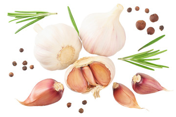garlic with rosemary, peppercorns and allspice isolated on white background. top view