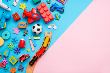 Frame of kids toys on color block pink and blue background - Powered by Adobe