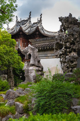 Fototapeta na wymiar Traditional building and sculpture in Yu Garden, Shanghai, China