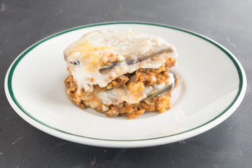 moussaka, eggplant of aubergine. In black background