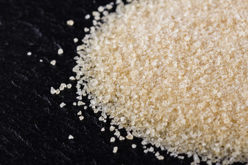 natural animal gelatin on a dark stone background