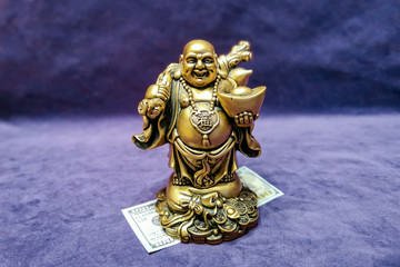 Chinese laughing god and american 100 dollars. Symbol of wealth and prosperity. Chinese New Year...