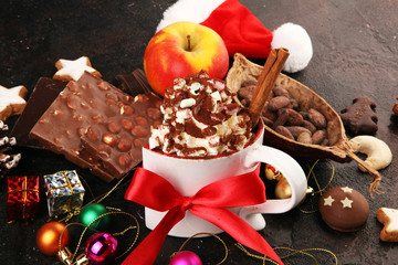 Hot chocolate cocoa with whipped cream for xmas on table and decoration