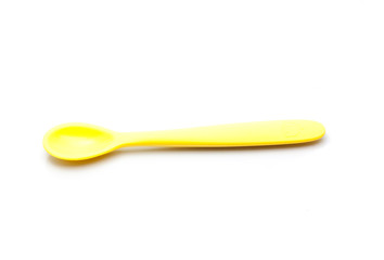 plastic spoon isolated on white