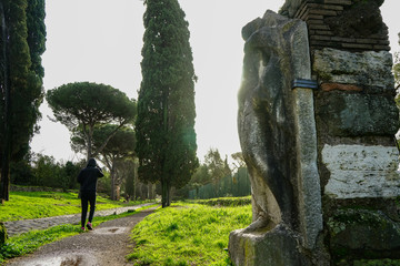 Jogging in Appia Antica beetween historical monuments, Rome, Lazio, Italia