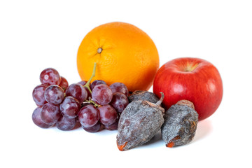 Grape, apple, orange and dry persimmon isolated on white background.