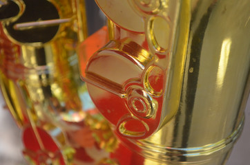A Toy Gold plastic Saxophone