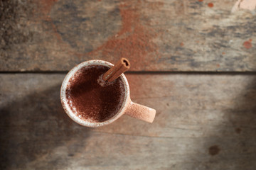 Fototapeta na wymiar chocolate drink on wooden table. .