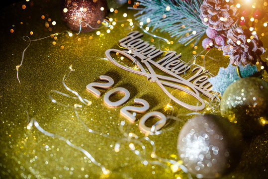 Happy new year 2020 on gold shiny background
