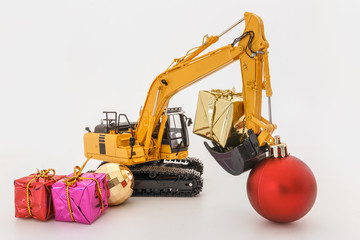 Christmas ornament and Excavator model , Holiday celebration concept happy new year on white background