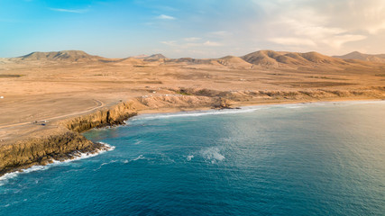 Fototapeta na wymiar Aerial view west coast of Fuerteventura at sunset, canary islands