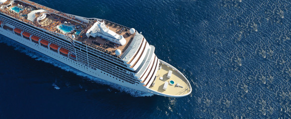 Aerial drone ultra wide photo of huge cruise liner in Mediterranean blue sea