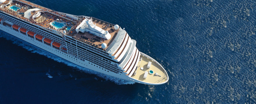 Aerial drone ultra wide photo of huge cruise liner in Mediterranean blue sea