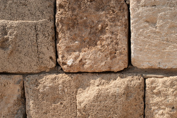 Piece of ancient stone wall in old Jaffa Port, Tel-Aviv, Israel.