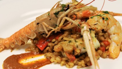 Vegetables and Fish used to cook Paella in the typical Spanish Way. This Spanish speciality can be made with seafood or meat