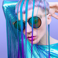 Futuristic Lady with violet hair. Trendy haircut concept