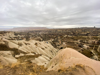 Ancient rock formations with caves. A famous place for flying in balloons. Cappadocia. Turkey November 5, 2019.