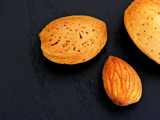 almonds close-up on a black background