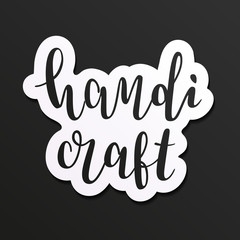 Handicraft handwritten logo, decorative sticker with lettering, beautiful calligraphy, good as sticker, logotype or label.