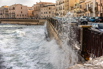  sea ​​waves crashing against the city wall