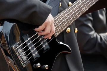 Fototapeta premium bass guitar player and details