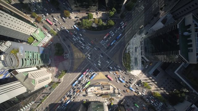 Traffic crosses a busy intersection in Gangnam, Seoul, Korea