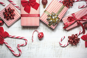 Different gift boxes on white wooden table