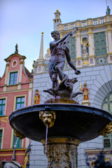 Fototapeta premium Details of Neptune's fountain in Gdańsk, Impressions from Gdańsk (Danzig in German) a port city on the Baltic coast of Poland