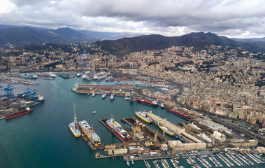 Drone view Aerial view panoramic view of Genoa in Italy with port, cruise ships, container and...