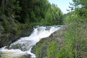 Kivach waterfall, river Suna, Republic of Karelia, Russia on nature forest landscape background