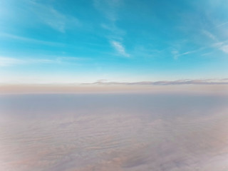 sky from an airplane porthole
