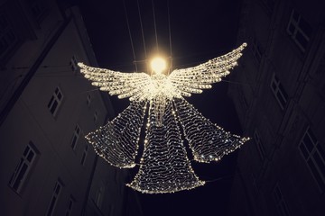 Street illumination in the form of a soaring angel