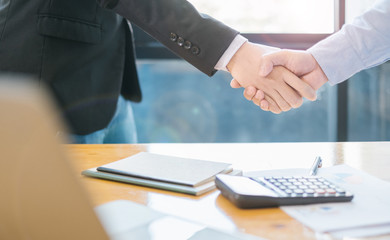 Business people shaking hands,handshake in office