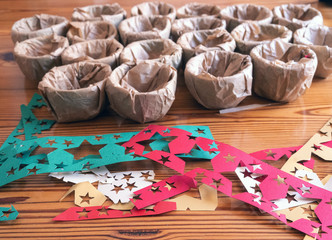 Preparing gifts, wrapped in ecological paper with colored stars