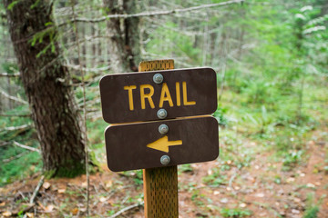 Hking Trail Sign With Direction Arrow Pointing Left