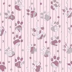Abstract spotted purple and gray cat or dog footprints on pink striped background.