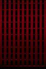 mysterious striped red metal bars in black background