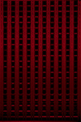 mysterious striped red metal bars in black background