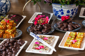 Dessert of chocolate and cake displayed on a dinner table