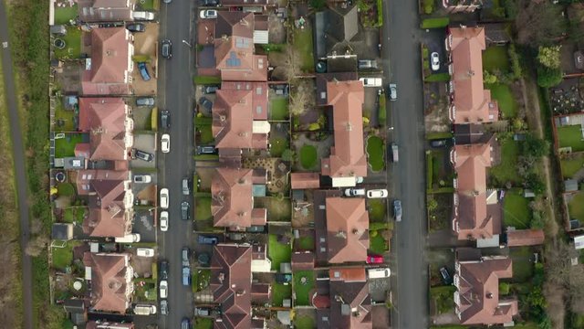 Aerial 4K fly over houses and gardens in Chester City, Cheshire, UK on Christmas Day, December 2019