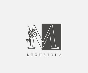 M Letter Logo.Luxury Black and White M With Classy Leaves Shape design perfect for fashion, Jewelry, Beauty Salon, Cosmetics, Spa, Hotel and Restaurant Logo.