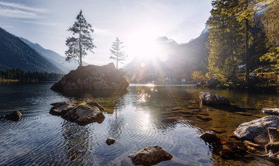 Fototapeta na wymiar Wonderful Lake Hintersee in the Alps of Bavaria on a summer morning. Awesome alpine highlands in sunny day. Amzaing Nutere Scenery. Scenic image of fairy-tale woodland in sunlit. Picture of wild area