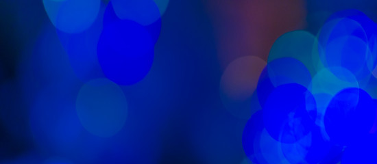 Abstract Bokeh color background of defocused glittering lights. Christmas, Party, New Year, luxurious  background pattern concept. banner