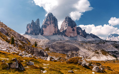 Wonderful Panorama View of dolomites Alps. World famous peaks of Tre Cime di Lavaredo National park. Awesome Alpine highlands in sunny day. Amazing Nature landscape. Best beautiful place in the World