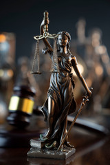 Law symbol composition and background. Judge's gavel, Themis statue and scale.