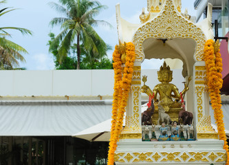 Traditional miniature Thai Spirit House to honor the spirits of the dead, Buddhism is a religion	