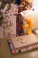 Wrapped Christmas presents on a dresser